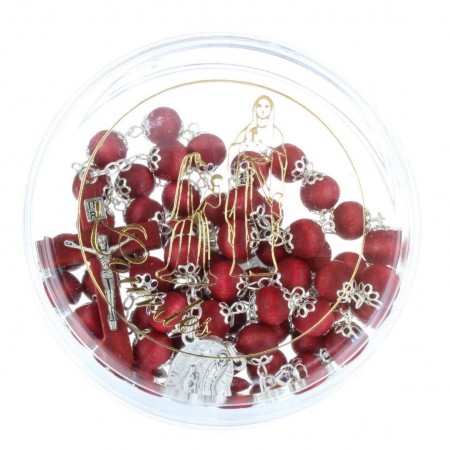 Rose-scented rosary and Lourdes Apparition in a box