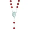 Rose-scented rosary in a glass bottle