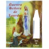 Lourdes prayer card and a vial of Lourdes water