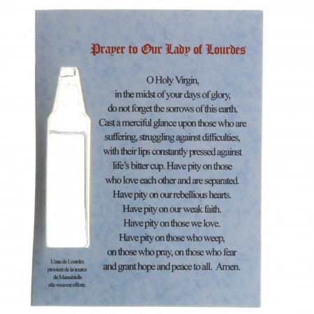 Lourdes prayer card and a vial of Lourdes water