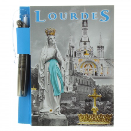 Lourdes notebook with a pen