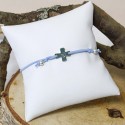 Bracelet croix avec l'apparition sur élastique bleu