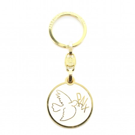 Keyring with gold plated dove on white background