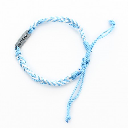 Bracelet tressé de Lourdes bleu et blanc dans un flacon