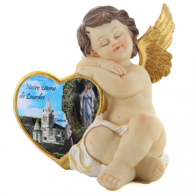 Angel statue with a heart Apparition of Lourdes