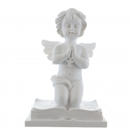 Angel praying on a book in white resin 8 cm