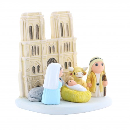 Culla di Natale con la cattedrale di Notre Dame de Paris in ceramica