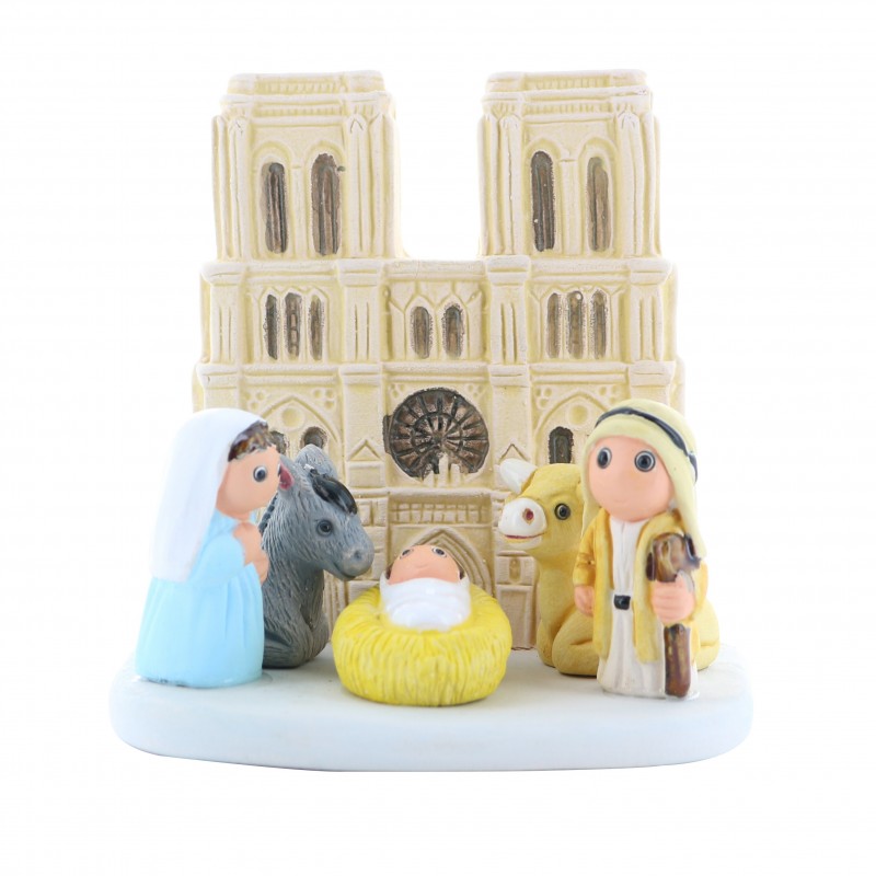 Culla di Natale con la cattedrale di Notre Dame de Paris in ceramica