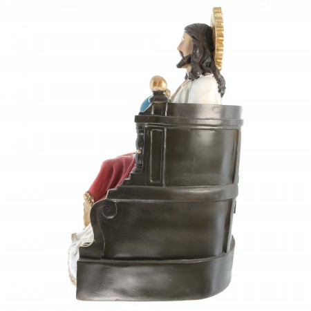Statue of Jesus sitting on the throne in resin