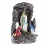 Statua dell'Apparizione di Lourdes nella grotta con luce