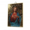 Wooden plaque of the Sacred Heart of Jesus on a mosaic background