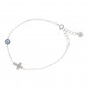 Bracelet en argent avec une croix et un rond bleu et blanc avec strass