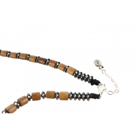 Necklace with wooden bead and hematite and cross pendant