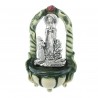 Green resin water font of the Apparition of Lourdes