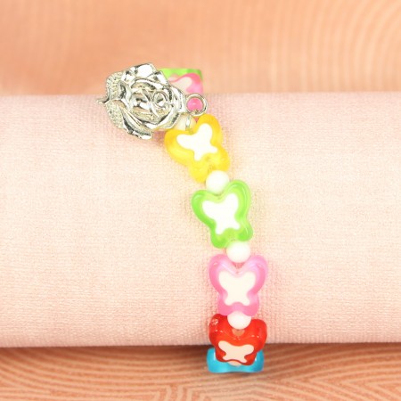 Bracelet enfant avec perles multicolores et papillon