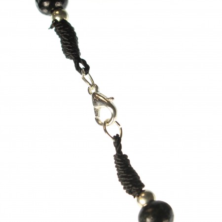Black wooden rosary of Saint Anthony with clasp and patters and metal heart of the Virgin and Child