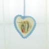 Cradle and heart medal in blue fabric
