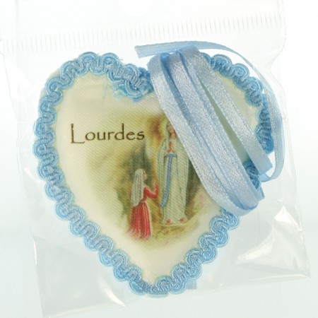 Cradle and heart medal in blue fabric