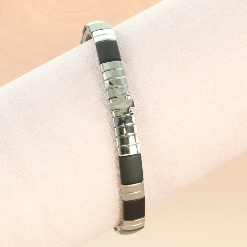 Men's black bracelet with steel cross