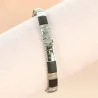 Men's black bracelet with steel cross