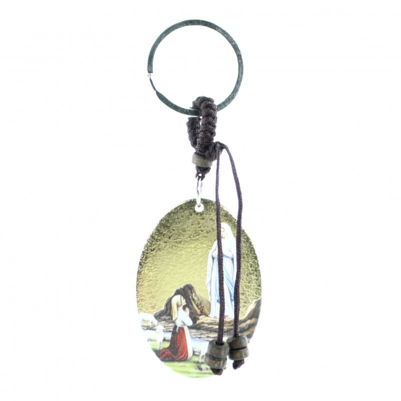 Porte clé ovale avec image de l'Apparition de Lourdes et boîte
