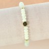 Bracciale in pietra naturale chiara e croce in metallo