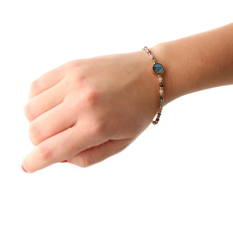 Bracelet avec médaille de la Vierge et pierres scintillantes