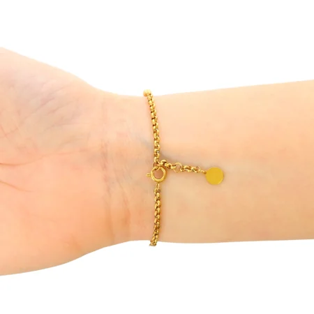 Bracciale con medaglione della Vergine in acciaio dorato