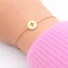 Bracciale placcato oro da 16 cm con medaglia rotonda e croce traforata