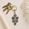 Metal key-ring of the Cross of Forgiveness