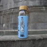 Gourde en verre remplie d'Eau de Lourdes