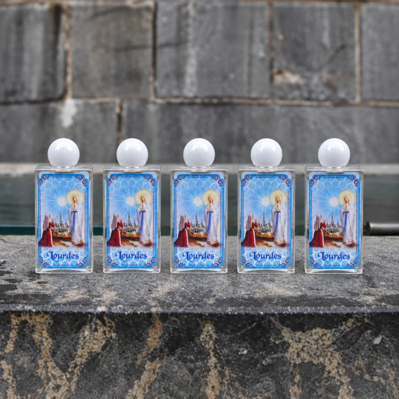 Set of five 80 ml plastic bottles with Lourdes water and Lourdes Apparition